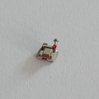 Мощные машины Стальная ортодонтическая MBT Roth сцепляемая самосвязывающаяся скобка для стоматологии